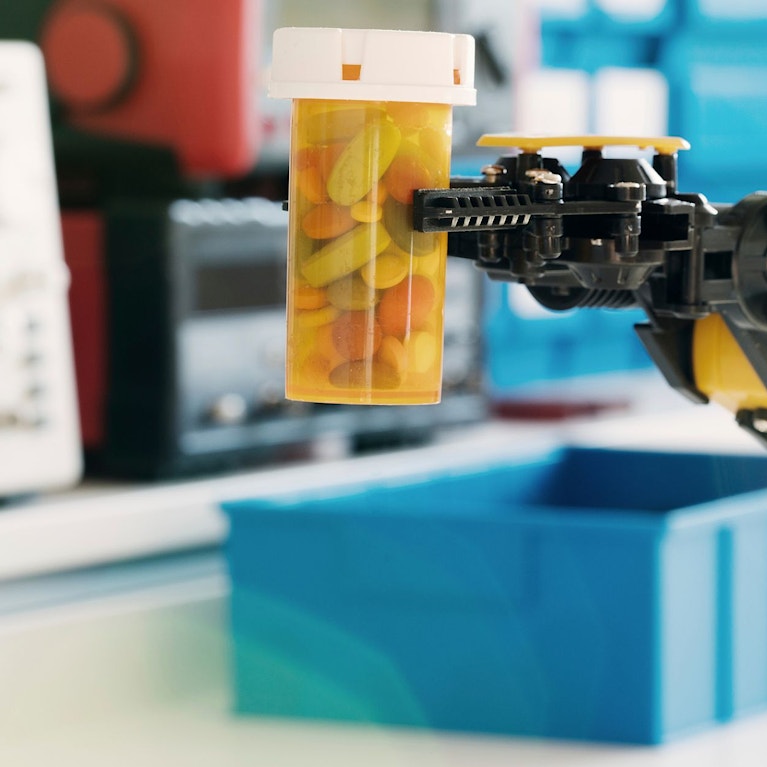 A machine holding some pills.