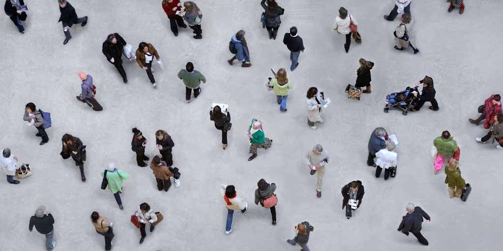 Aerial view of people walking in city