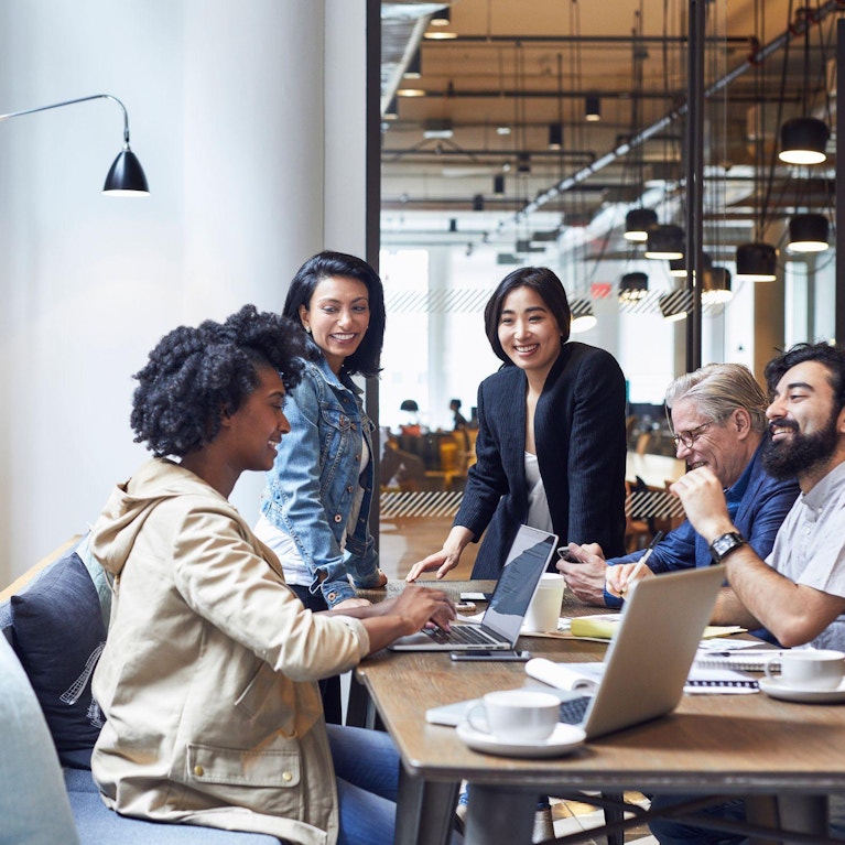 Colleagues working in office