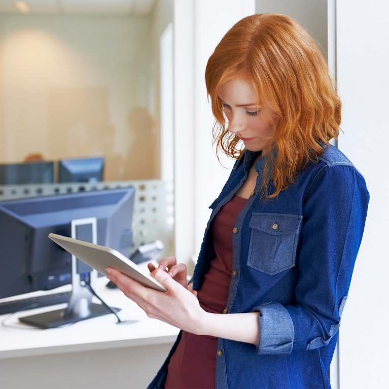 Businesswoman on tablet