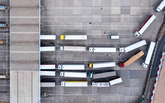 Aerial view of harbour and trucks parked alongside each other