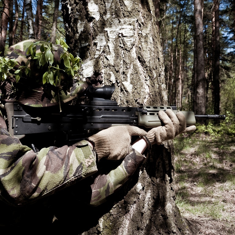 Special operations soldier in military camouflage