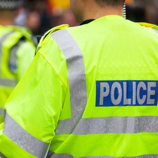 Police officers wearing high-visibility vests