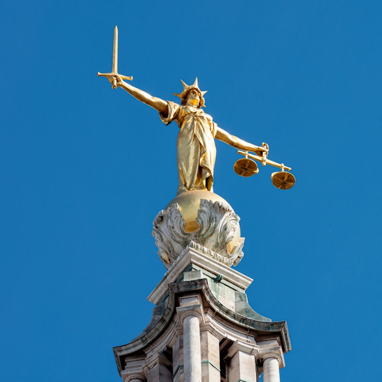 Looking up at Lady Justice statue in London