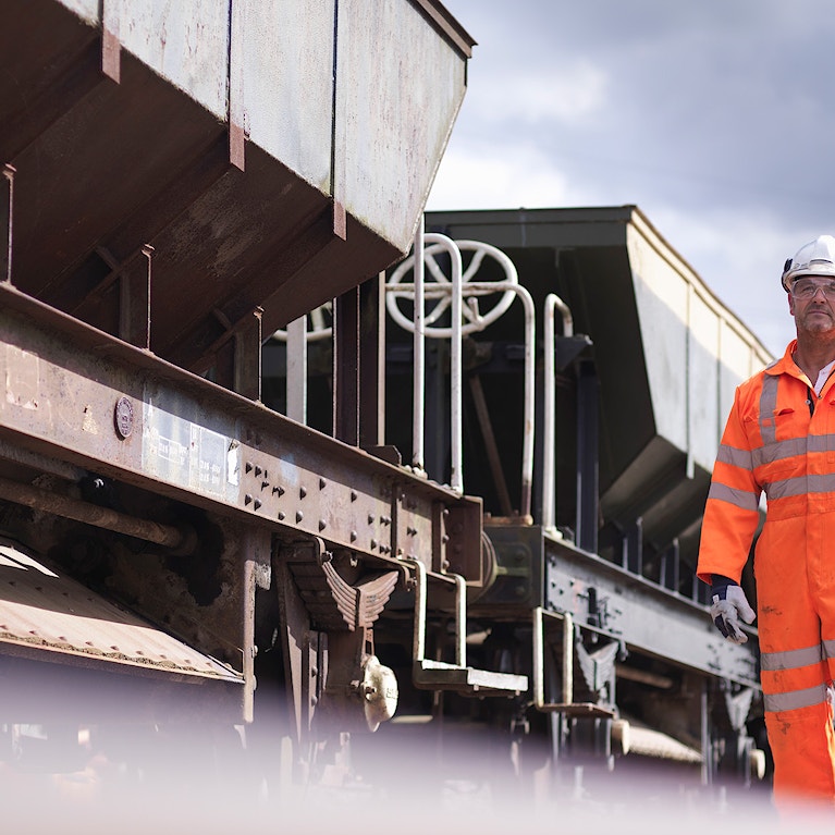 Rail worker near a train