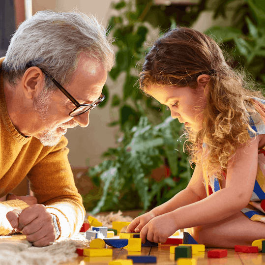 Person playing with their grandchild